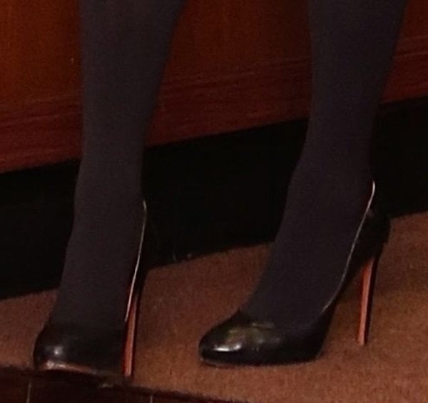 Paris Hilton's black tights and matching pumps