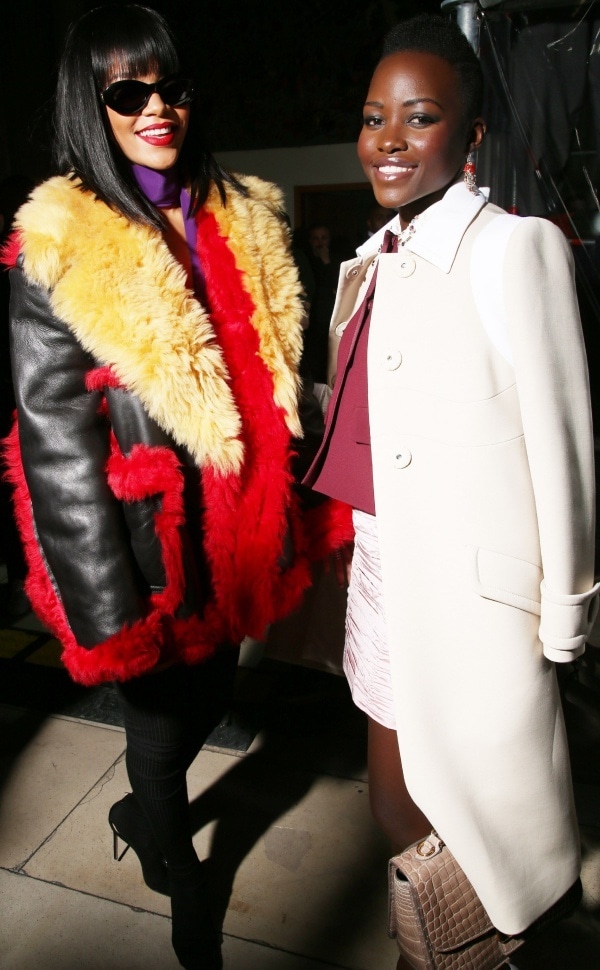 Rihanna and Lupita Nyong'o at the Miu Miu Fall/Winter 2014 runway presentation during Paris Fashion Week