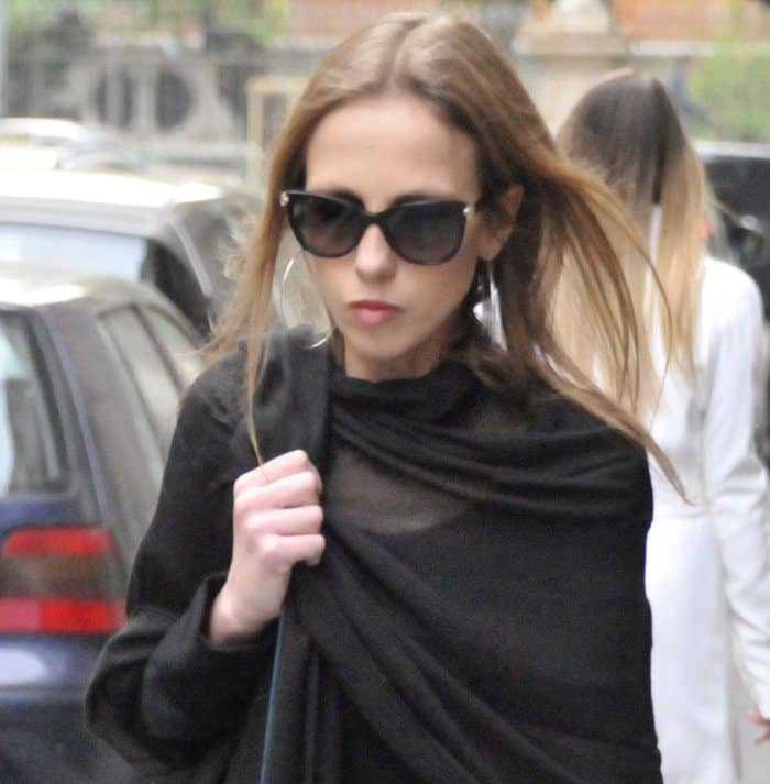 Allegra Versace wears her hair down while shopping in Milan, Italy