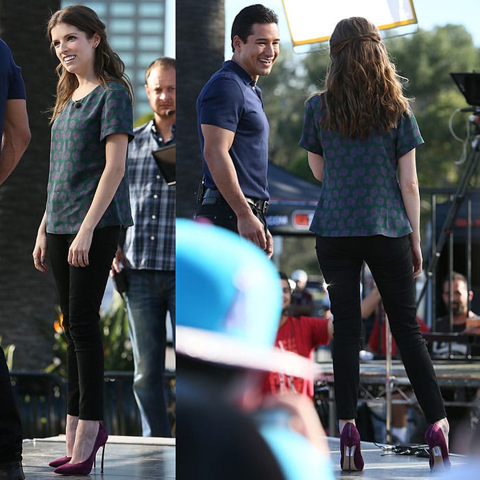 Anna Kendrick being interviewed by Mario Lopez for the TV show, Extra, at Universal Studios Hollywood on February 11, 2015