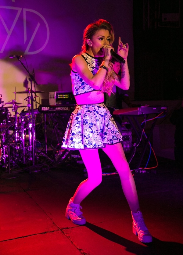 Cher Lloyd performs at Star Magazine's "Hollywood Rocks" party in a floral LaQuan Smith set