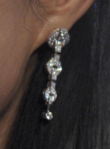 Wendi Deng Murdoch wearing three-tiered link diamond earrings