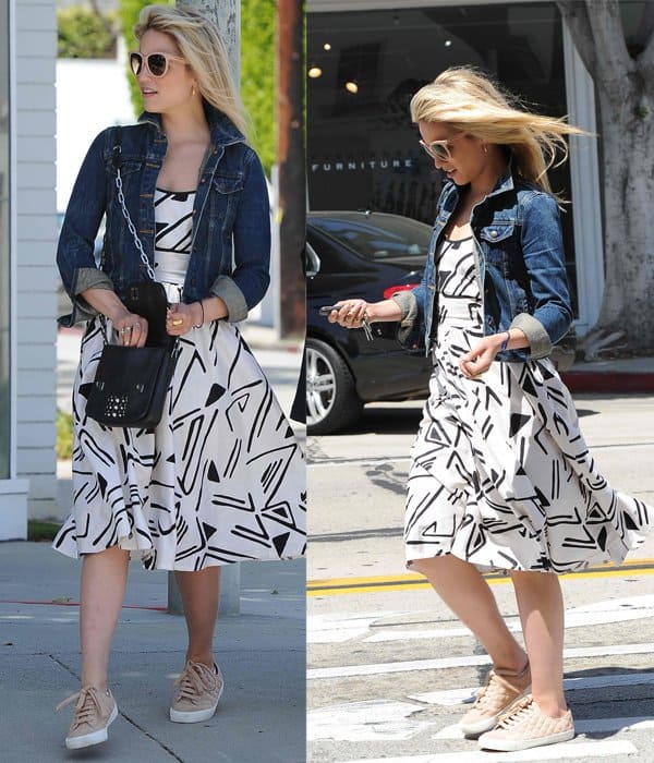 Dianna Agron wears a denim jacket with a flared dress