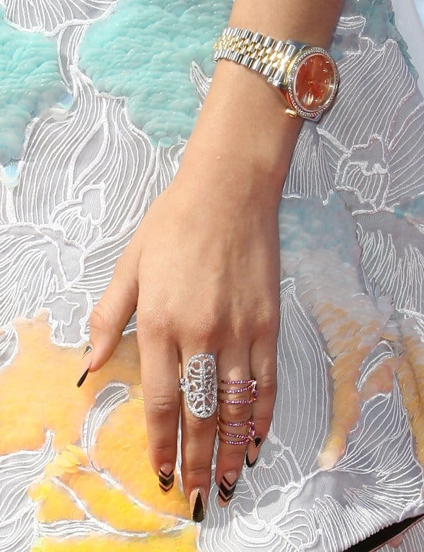 Zendaya decorated her fingers with statement rings of different sizes and colors
