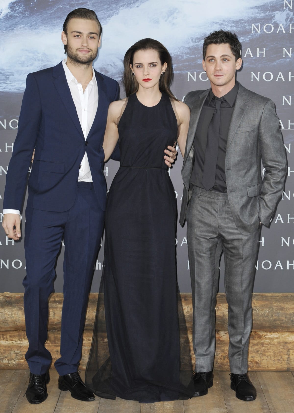 Logan Lerman has a height of 5ft 7 ½ (171.5 cm), Douglas Booth stands at 6ft 0 (182.9 cm), and Emma Watson's height is 5ft 4 ¾ (164.5 cm)