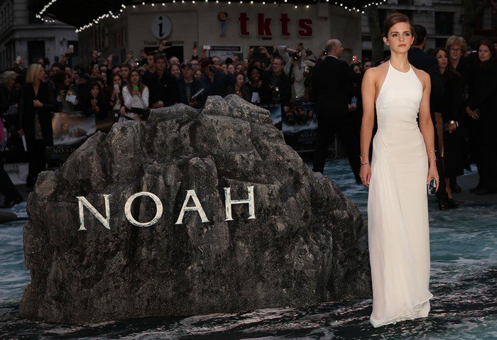 Emma Watson stuns at the premiere of "Noah" in a white silk Ralph Lauren gown