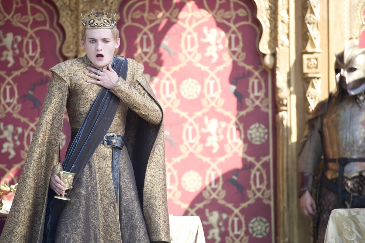 Jack Gleeson as Joffrey Baratheon dies from poisoned wine due to a plot by Lady Olenna Tyrell and Lord Petyr Baelish