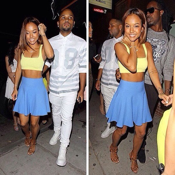 Karrueche Tran smiles in an Alexander Wang crop top