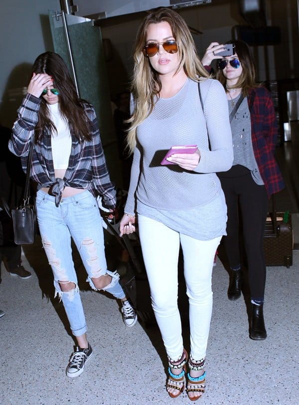 Khloe Kardashian, Kendall Jenner, Kylie Jenner arrive at Los Angeles International Airport (LAX)