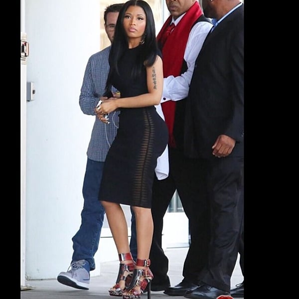 Nicki Minaj flaunted her legs in a black Alexander McQueen two-piece outfit