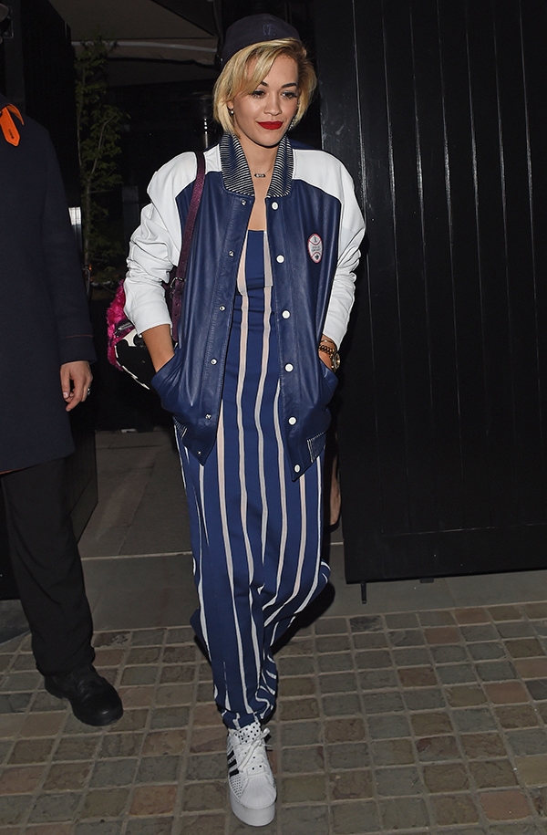 Rita Ora in a navy-and-white adidas Originals x Opening Ceremony number at Firehouse Private Members Club
