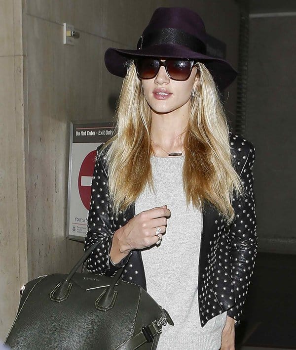 Rosie Huntington-Whiteley's purple Eugenia Kim hat and Saint Laurent Spencer jacket