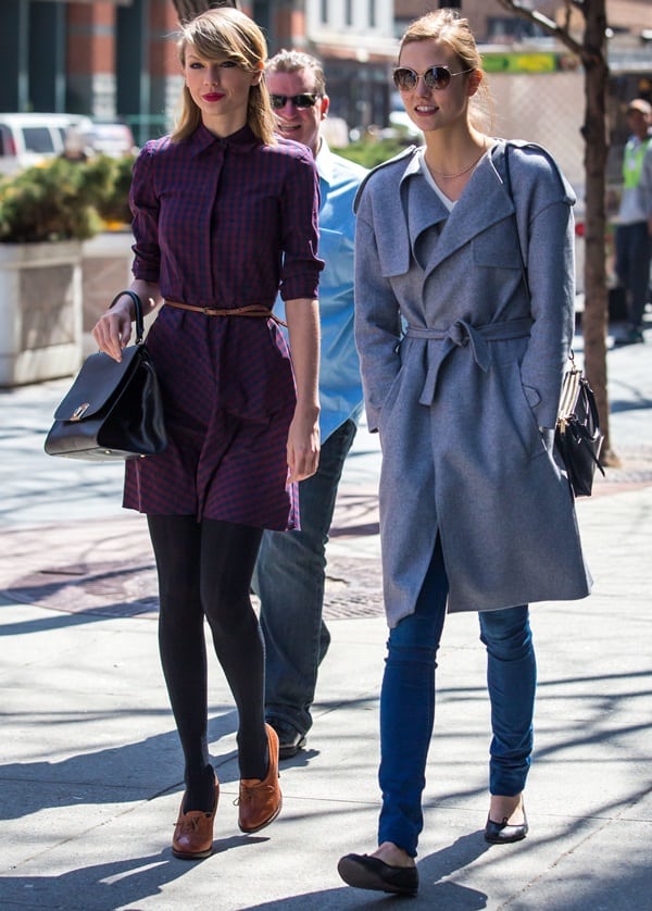 Taylor Swift wore a red-and-blue collared mini dress and Karlie Kloss a gray trench coat and skinny jeans