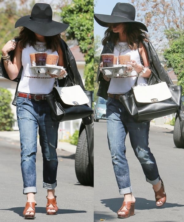 Vanessa Hudgens serves laid-back boho vibes in Studio City, pairing Wildfox boyfriend jeans and See by Chloé espadrille wedges with a Cuore & Pelle Caterina bag and oversized fedora