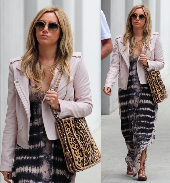 Ashley Tisdale in an interesting outfit finished with an animal-print tote and cutout lace-up sandals