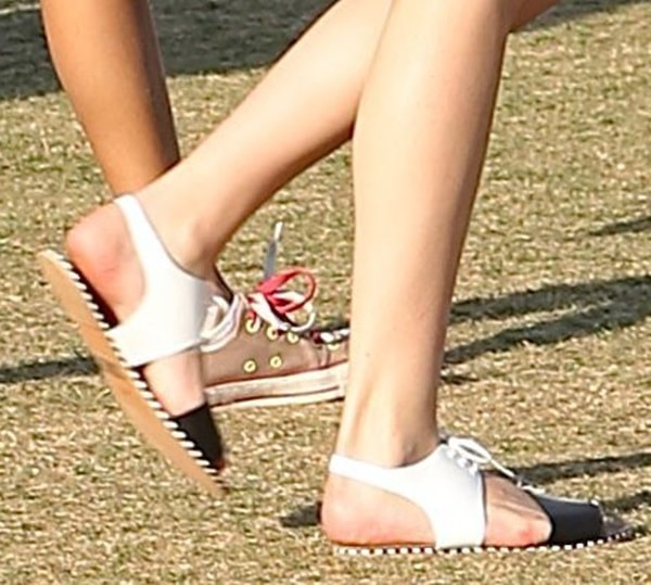 Bella Thorne rocking monochromatic lace-up sandals