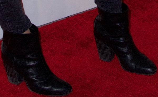Katie Holmes wearing black leather ankle boots from Rag & Bone