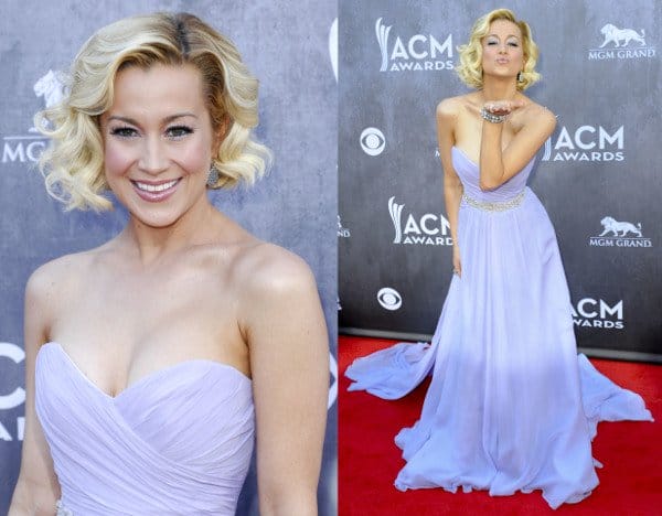 Kellie Pickler completes her look with a chic updo, sparkling earrings, and a radiant smile