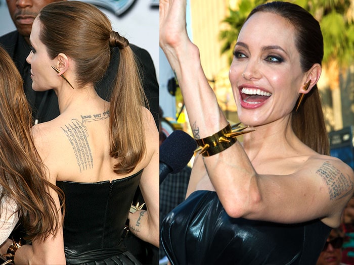 Angelina Jolie's chestnut hair slicked back into a ponytail
