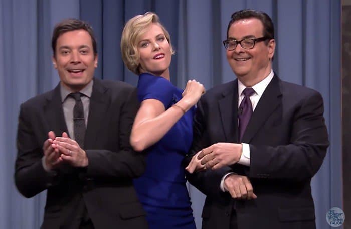 Charlize Theron looked stylish in a blue outfit as she made an appearance on The Tonight Show Starring Jimmy Fallon in New York City, where she had a playful game of Charades with Josh Hartnett while promoting her upcoming movie A Million Ways to Die in the West