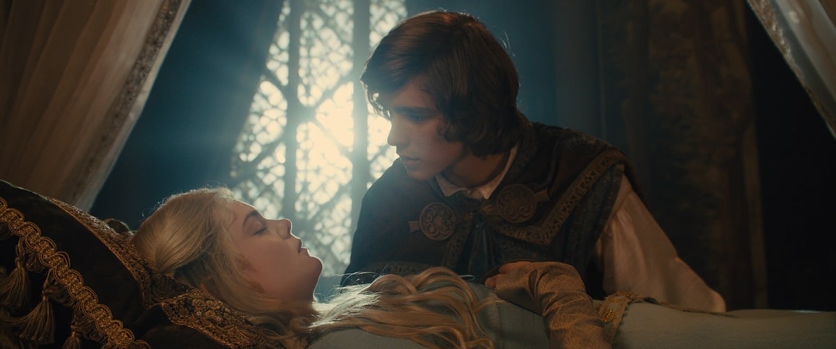 Elle Fanning as Aurora and Brenton Thwaites as Prince Phillip in the 2014 fantasy film Maleficent