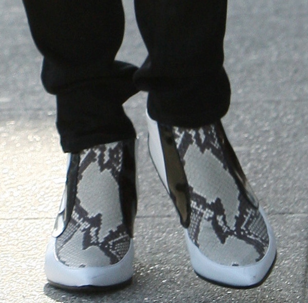 Emma Roberts' distinctive snakeskin ankle boots by Rodarte