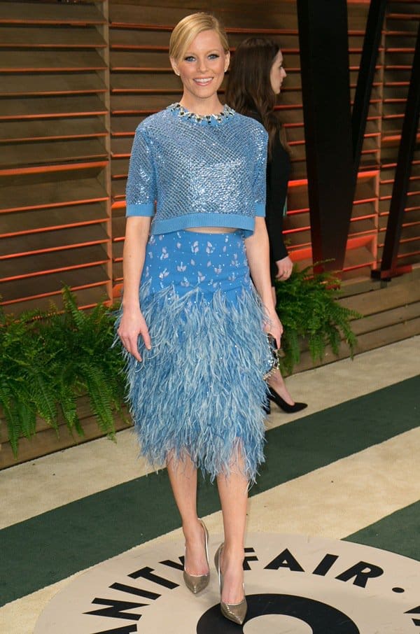 Elizabeth Banks shines in a sequined Jenny Packham dress with a feathered skirt at the 2014 Vanity Fair Oscar Party, March 2, 2014