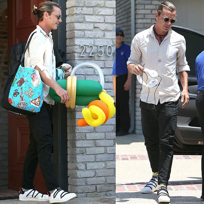 Gavin Rossdale loading their kids' things into their car after attending Joel Silver's Memorial Day party