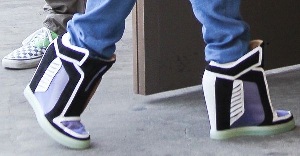 Gwen Stefani wearing wedge fashion sneakers