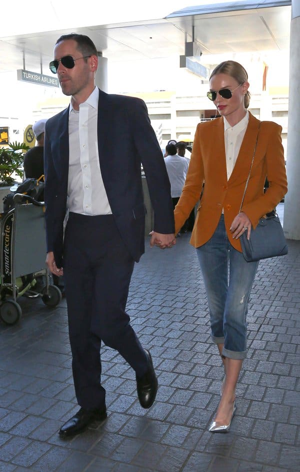 Kate Bosworth leaves Los Angeles International Airport (LAX) holding hands with her husband, Michael Polish, in Los Angeles