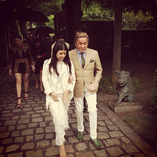 Kourtney Kardashian walking with Valentino Garavani