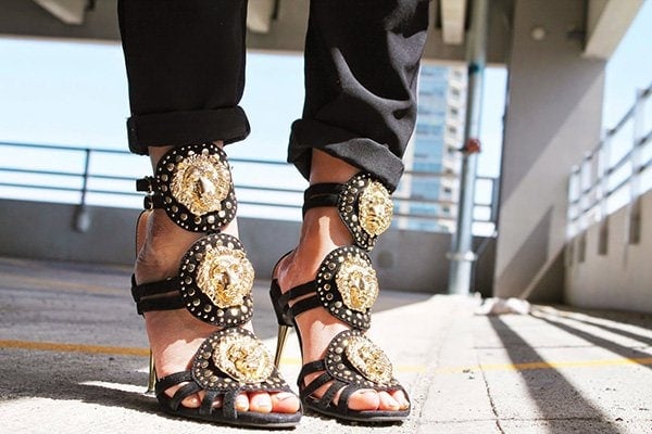 Mai's shoes with lion head medallions