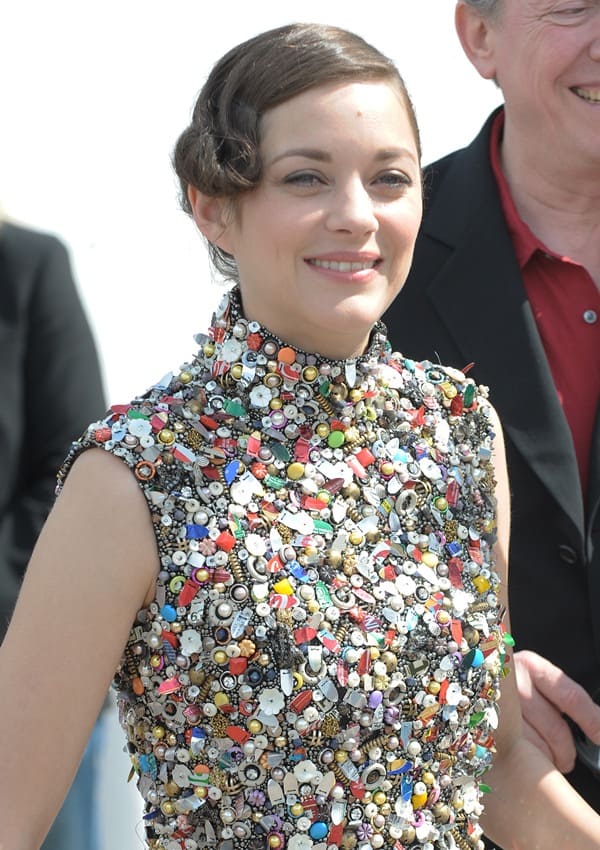 Marion Cotillard showcases her elegant pinned-up hairstyle at the Cannes Film Festival