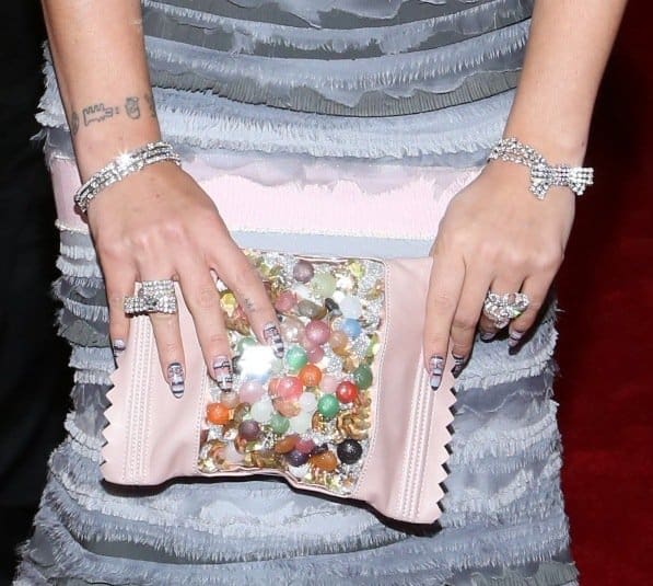 Lily Allen chose a quirky candy clutch to offset her glam look