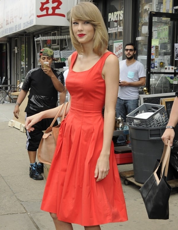 Taylor Swift's vermilion red cotton-blend A-line dress from Oscar de la Renta