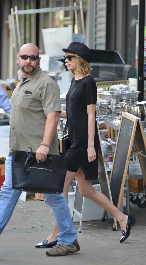 Taylor Swift in a casual wide-neck jersey dress