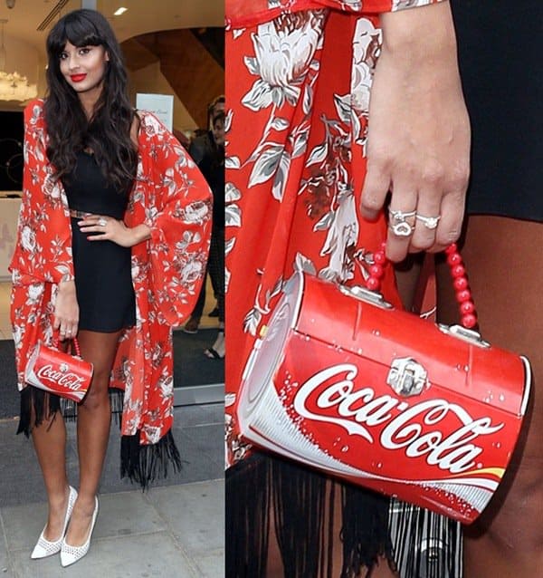 Jameela Jamil turns heads in a red floral kimono and black mini dress, playfully accessorized with a retro Coca-Cola can purse and white studded pumps at Pandora’s #MyRingsMyStyle launch in London