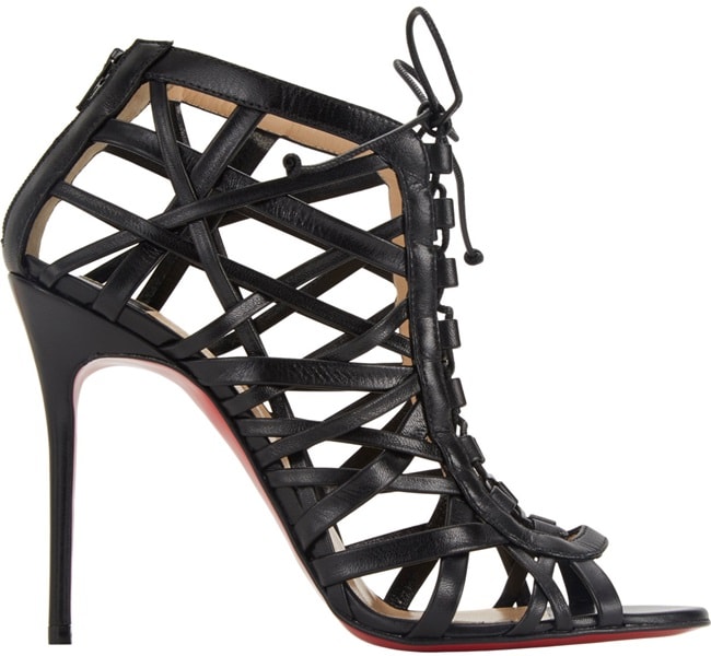Charlize Theron added a few inches to her height with a pair of Christian Louboutin "Laurence Anyway" cage sandals