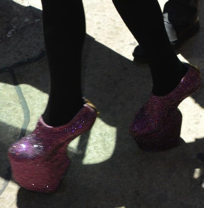 Daphne Guinness steps out in eye-catching glittery heel-less shoes