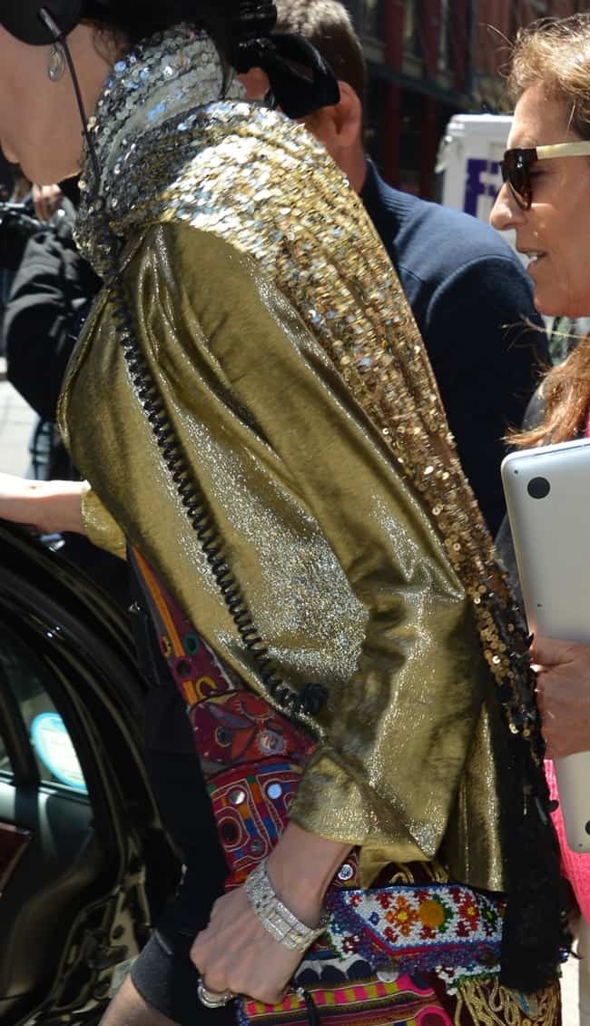 Daphne Guinness carries a bohemian masterpiece: a beaded and embroidered bag with intricate patterns