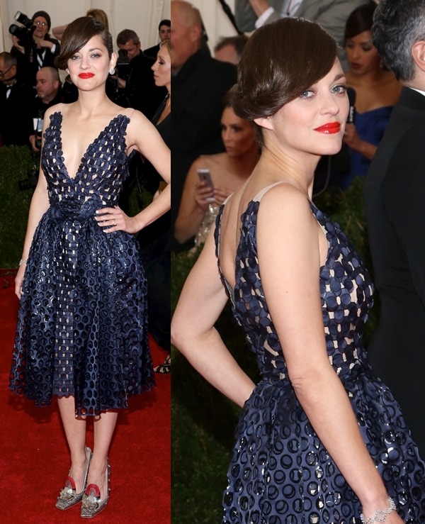 Marion Cotillard kicking it up a notch by wearing Dior Haute Couture at the 2014 Met Gala held at the Metropolitan Museum of Art in New York City on May 5, 2014