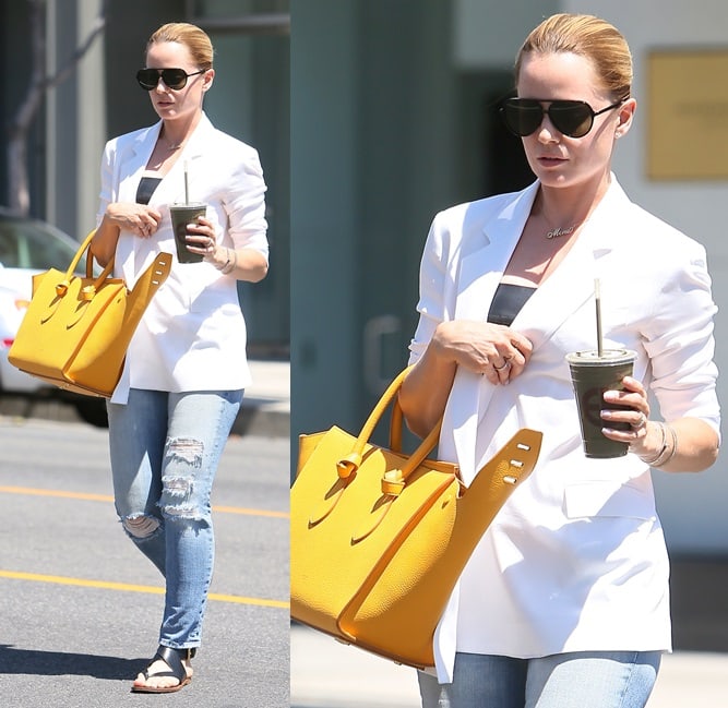 Mena Suvari looking quite chic in her white topper and flat strappies while out and about in Los Angeles