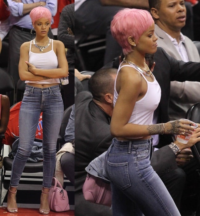 Rihanna debuted her new hot pink pixie hairstyle at the LA Clippers vs. Oklahoma Thunder game in Los Angeles on May 15, 2014