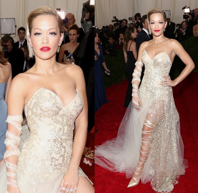 Rita Ora wearing striking strappy thigh-high pumps at the 2014 Met Gala held at the Metropolitan Museum of Art in New York City on May 5, 2014