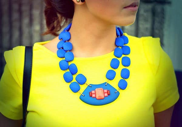 Amparo's cool necklace matched well with her neon yellow top