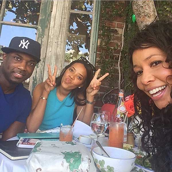 Celebrating fitness and friendship, Angela Simmons enjoys a delightful lunch with trainers Mike T and Jeanette Jenkins, as showcased in her Instagram post captioned 'What a great lunch with @forcefitnessinc @msjeanettejenkins !! Fitness gurus !!! #WeBuilding', hinting at an upcoming fitness venture (Posted June 6, 2014, Credit: Angela Simmons' Instagram)