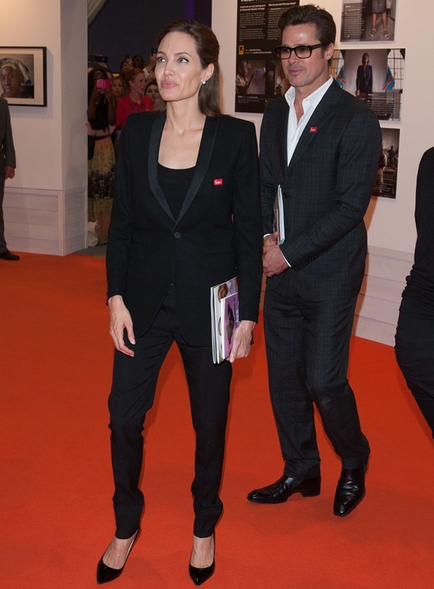 Angelina Jolie styled her black suit with matching black patent pumps