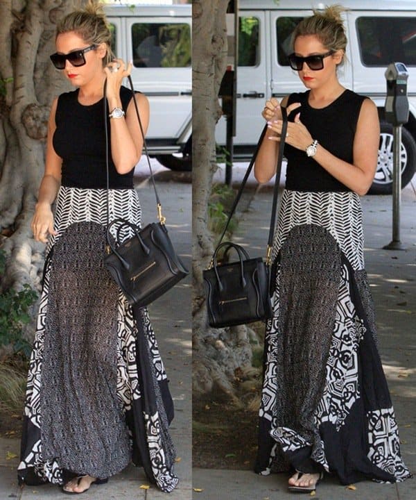 Ashley Tisdale keeps it chic in a Free People Little Dreamer maxi skirt, Celine Nano Luggage tote, and comfy sandals while heading to Nine Zero One Salon on June 12, 2014