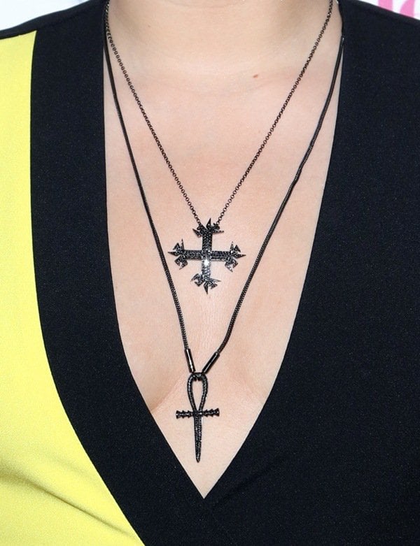 Demi Lovato's layered cross and ankh necklaces add an edgy touch to her stylish outfit