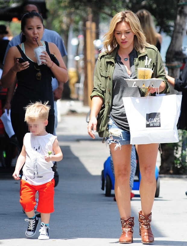 Hilary Duff flaunts her legs in blue distressed denim shorts by Rag & Bone